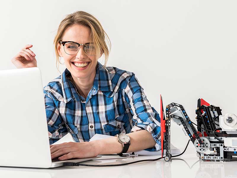 Woman Engineer on Computer Happy
